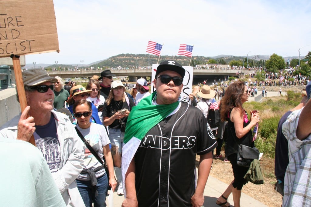 Wearing a Mexican flag, Ezequiel Ramirez attended 'No Kings' to support his people. Photo by Xavey Bzdek
